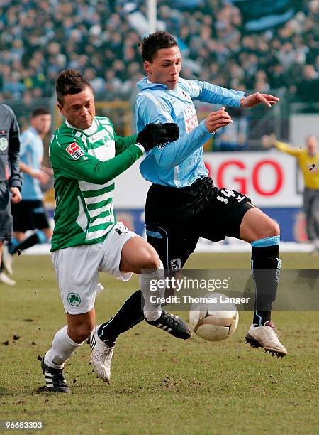 Stephan Schroeck of Fuerth and Jose Holebas of Muenchen battle for the ball during the 2nd Bundesliga match between SpVgg Greuther Fuerth and TSV...