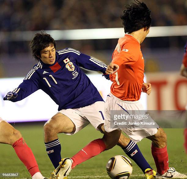 Keiji Tamada of Japan in action during the East Asian Football Championship 2010 match between Japan and South Korea at the National Stadium on...