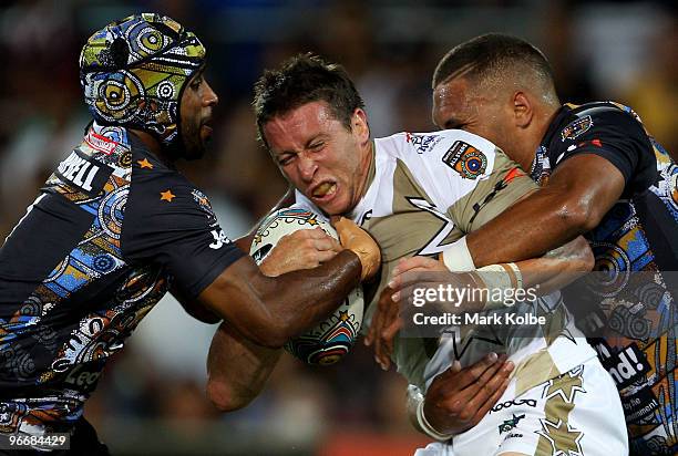 Kurt Gidley of the NRL All Stars is tackled during the Indigenous All Stars and the NRL All Stars match at Skilled Park on February 13, 2010 on the...