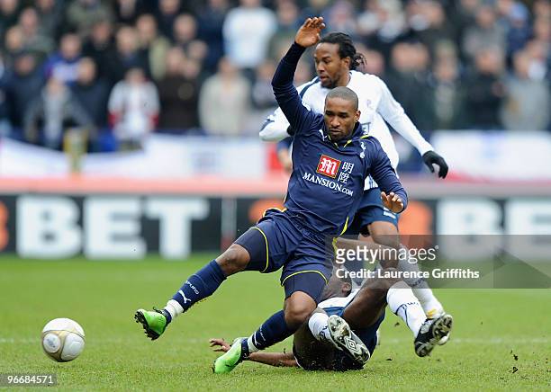 Fabrice Muamba of Bolton Wanderers brings down Jermain Defoe of Tottenham Hotspur during the FA Cup sponsored by E.ON Fifth round match between...