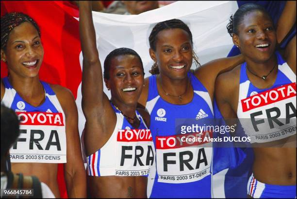 Christine Arron, Patricia Girard, Sylvianne Felix ans Muriel Hurtis win gold medal in Women's 4x100 meters relay.