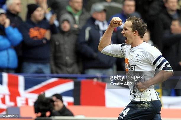 Bolton Wanderers' English forward Kevin Davies celebrates after scoring the opening goal during the FA Cup Fifth round football match against...