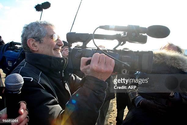 French film director Claude Lelouch briefs people on February 14, 2010 in Deauville, western France, where he invited couples for St Valentine's day...