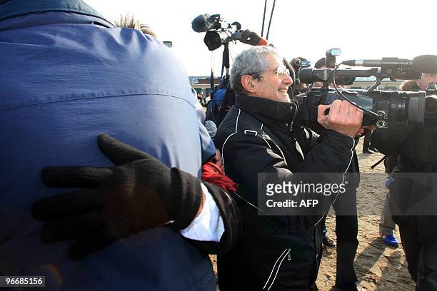 French film director Claude Lelouch films on February 14, 2010 in Deauville, western France, where he invited couples for St Valentine's day to...