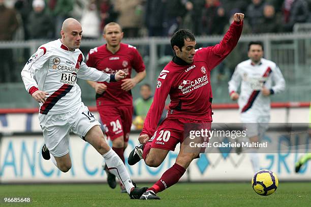 Claudio Bellucci of AS Livorno Calcio in action against Roberto Guana of Bologna FC during the Serie A match between AS Livorno Calcio and Bologna FC...