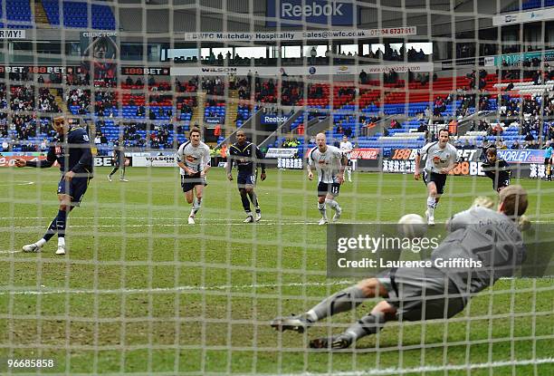 Jussi Jaaskelainen of Bolton Wanderers saves the penalty kick of Tom Huddlestone of Tottenham Hotspur during the FA Cup sponsored by E.ON Fifth round...