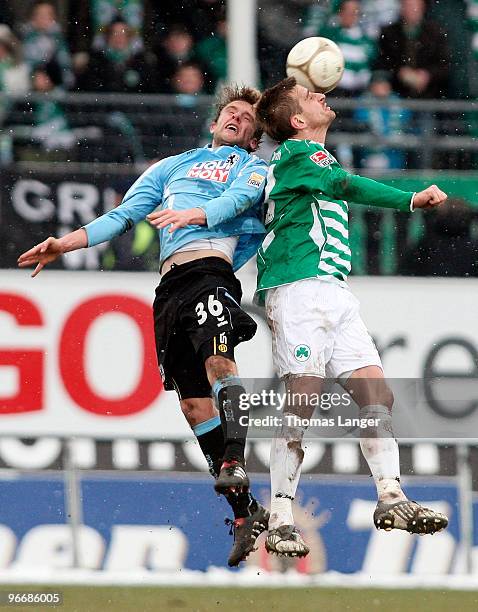 Milorad Pekovic of Fuerth and Dominik Stahl of Muenchen head for the ball during the 2nd Bundesliga match between SpVgg Greuther Fuerth and TSV 1860...