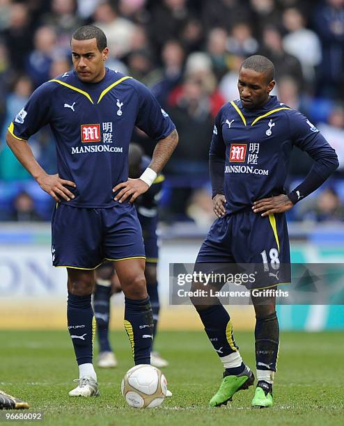 Tom Huddlestone and Jermain Defoe of Tottenham Hotspur look dejected after conceding a goal during the FA Cup sponsored by E.ON Fifth round match...