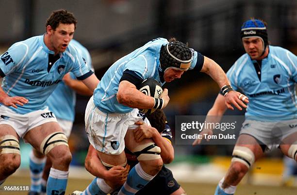 Ben Woods of Leicester Tigers is challenged during the Guinness Premiership match between Leeds Carnegie and Leicester Tigers at Headingley Stadium...