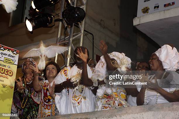 Queen Gisele Santos and members of Ile Aiye group gather in front of Barro Preto Terreiro with Chieff of staff Dilma Rousseff frees some doves , as...