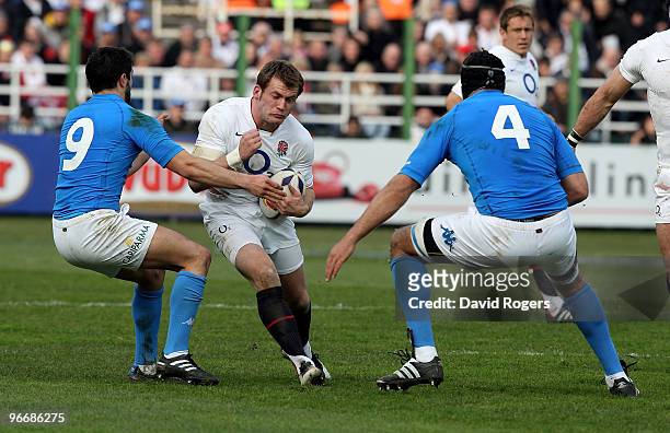 Mark Cueto of England takes on Tito Tebaldi and Quintin Geldenhuys during the RBS Six Nations match between Italy and England at Stadio Flaminio on...