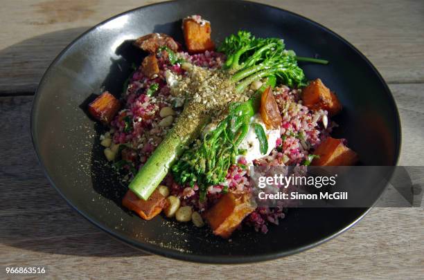 salad of brown rice, quinoa, sweet potato, beetroot relish, broccolini, seeds and tahini yoghurt - broccolini stock pictures, royalty-free photos & images