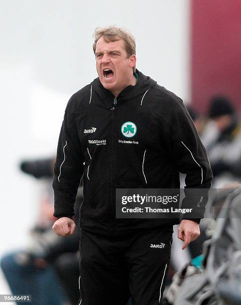 Head coach Mike Bueskens shouts during the 2nd Bundesliga match between SpVgg Greuther Fuerth and TSV 1860 Muenchen at the Playmobil Stadium on...