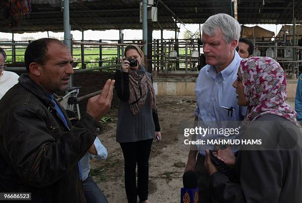 Congressman Brian Baird speaks with a Palestinian man during an inspection visit to the northern Gaza Strip on February 14, 2010. Two US Democrat...