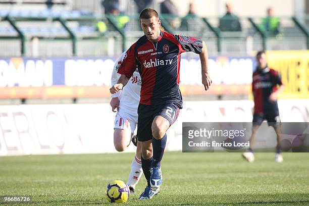 Michele Canini of Cagliari in action during the Serie A match between Cagliari Calcio and AS Bari at Stadio Sant'Elia on February 14, 2010 in...