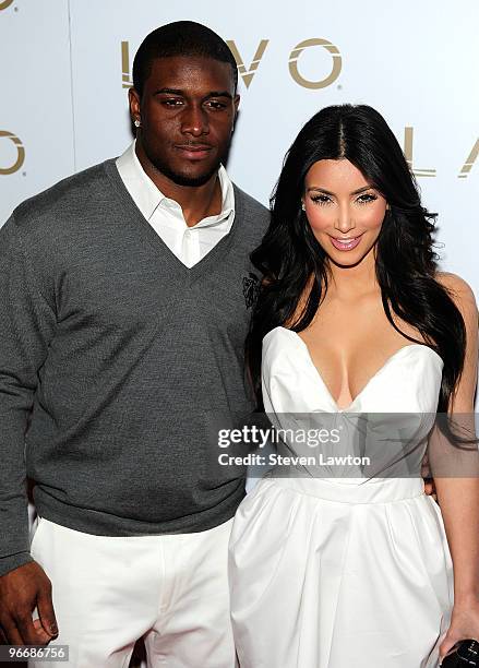 Pro football player Reggie Bush and television personality Kim Kardashian arrive for "Queen Of Hearts" ball at Lavo Restaurant & Nightclub at The...