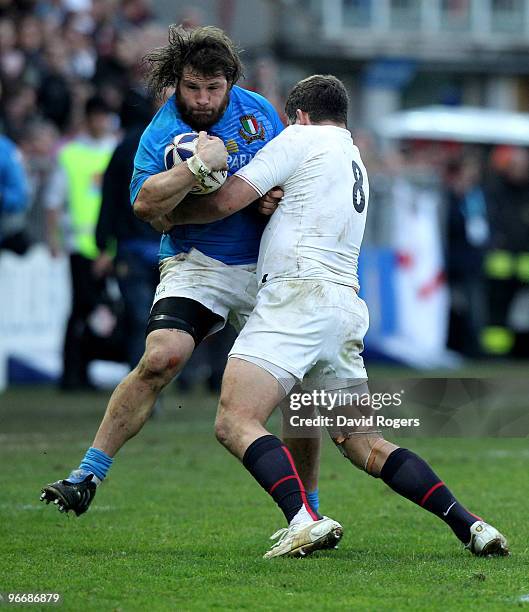 Martin Castrogiovanni of Italy is tackled by Nick Easter during the RBS Six Nations match between Italy and England at Stadio Flaminio on February...