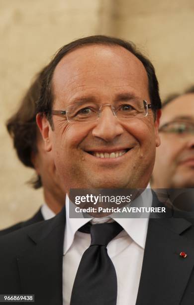 French President Francois Hollande with his partner Valerie Trierweiler visit the fondation Lambert on July 15, 2012 in Avignon, southern France,...