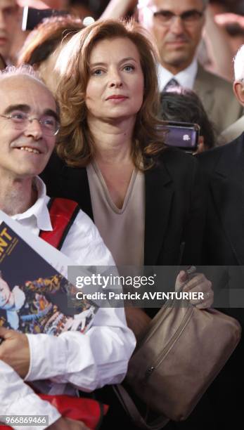 French President Francois Hollande with his partner Valerie Trierweiler visit the "Off festival" on July 15, 2012 in Avignon, southern France, during...