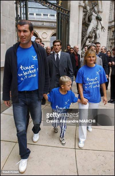 Zidane, Yann and his mother Regine during the "Tous en baskets pour battre la maladie" operation held in Lyon as a fundraiser for leucodystrophy...