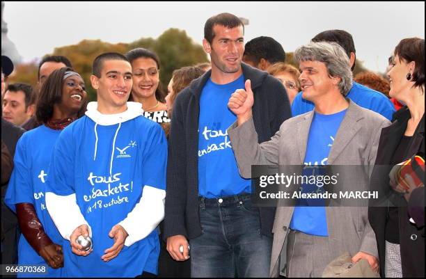 Tous en baskets pour battre la maladie" operation held in Lyon as a fundraiser for leucodystrophy research. Zinedine Zidane and Guy Alba for the...