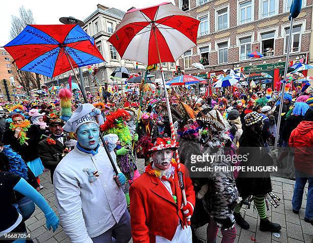 Several thousands disguised people parade in the streets of Dunkirk, on February 14 northern France, as part ot the town's carnival. AFP PHOTO...
