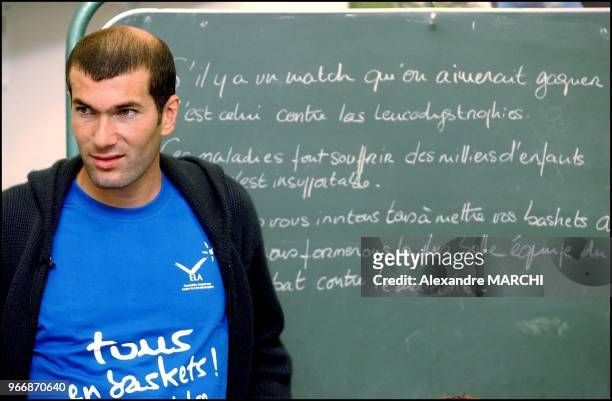 Tous en baskets pour battre la maladie" operation held in Lyon as a fundraiser for leucodystrophy research. Zinedine Zidane and Yann in a school to...