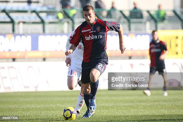 Michele Canini of Cagliari in action during the Serie A match between Cagliari Calcio and AS Bari at Stadio Sant'Elia on February 14, 2010 in...