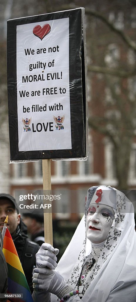 A protester holds a placard during a dem