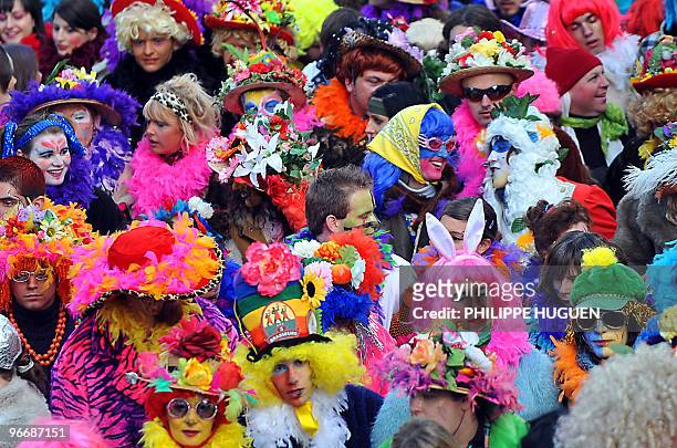 Several thousands disguised people parade in the streets of Dunkirk, on February 14 northern France, as part ot the town's carnival. AFP PHOTO...