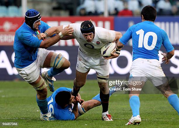 James Haskell of England runs through the Italy defence during the RBS 6 Nations match between Italy and England at Stadio Flaminio on February 14,...