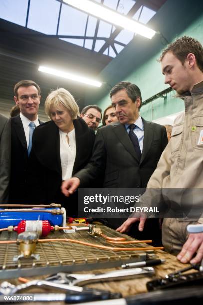 French Prime Minister Francois Fillon and French Minister Nadine Morano during visiting learning institut on January 25, 2012 in Lyon, France.