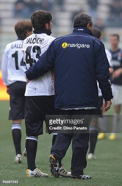 Alberto Paloschi of Parma is helped from the pitch after sustaining an injury during the Serie A match between Parma FC and SS Lazio at Stadio Ennio...