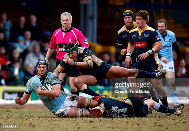 Geoff Parling of Leicester Tigers is tackled during the Guinness Premiership match between Leeds Carnegie and Leicester Tigers at Headingley Stadium...