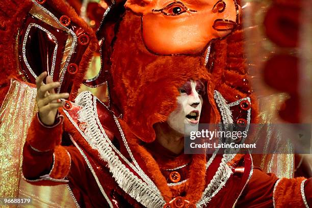 Member of Mocidade Alegre dances on a float during the samba school's parade during the second day of Sao Paulo's carnival on February 14, 2010 in...