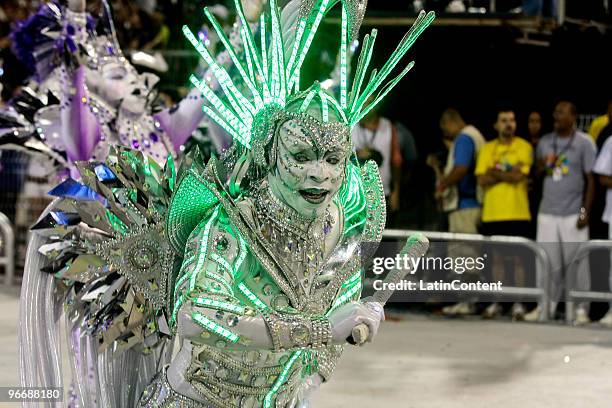 Member of Mocidade Alegre dances on a float during the samba school's parade during the second day of Sao Paulo's carnival on February 14, 2010 in...