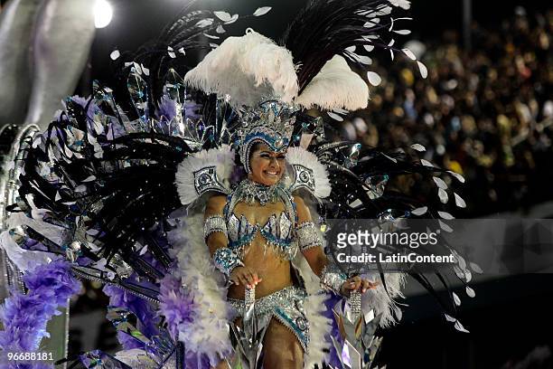 Members of Mocidade Alegre dance on a float during the samba school's parade during the second day of Sao Paulo's carnival on February 14, 2010 in...