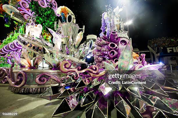 Members of Mocidade Alegre dance on a float during the samba school's parade during the second day of Sao Paulo's carnival on February 14, 2010 in...