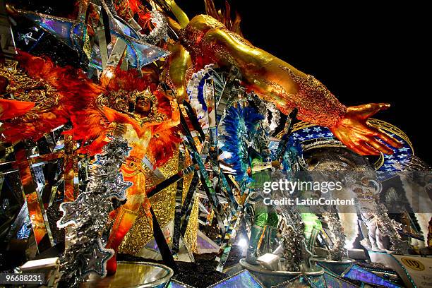 Members of Mocidade Alegre dance on a float during the samba school's parade during the second day of Sao Paulo's carnival on February 14, 2010 in...