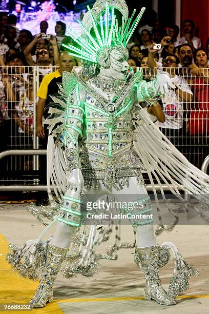 Member of Mocidade Alegre dances on a float during the samba school's parade during the second day of Sao Paulo's carnival on February 14, 2010 in...