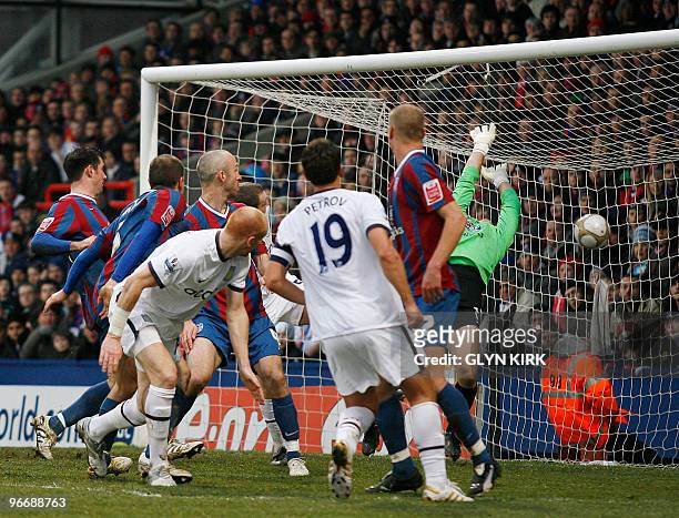 Aston Villa's Welsh defender James Collins scores a goal during their FA Cup fifth round football match against Crystal Palace at Selhurst Park, in...