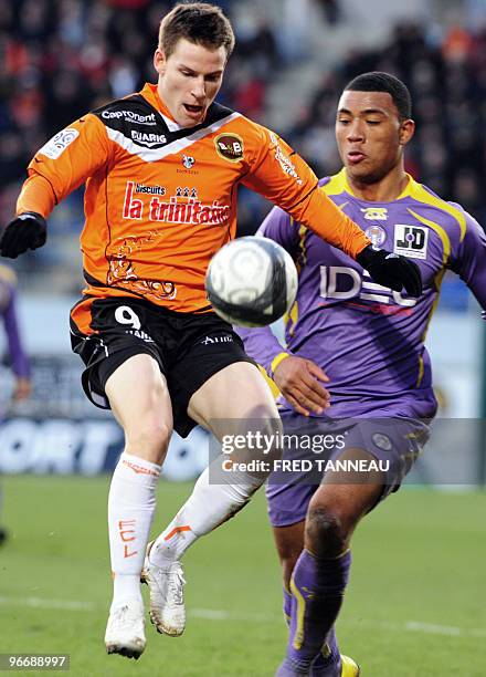Toulouse's forward Colin Kazim-Richard vies with Lorient's forward Kevin Gameiro during their French L1 football match Lorient vs. Toulouse, on...
