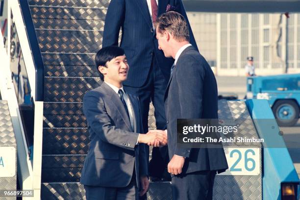 Crown Prince Naruhito shakes hands with Prince Philippe of Belgium on arrival at Brussels Airport on September 24, 1989 in Brussels, Belgium.