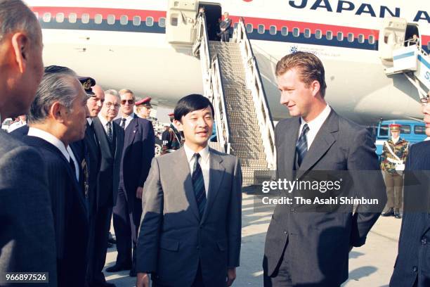 Crown Prince Naruhito is welcomed by Prince Philippe of Belgium on arrival at Brussels Airport on September 24, 1989 in Brussels, Belgium.