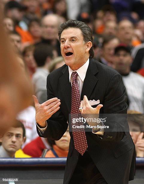 Coach Rick Pitino of the Louisville Cardinals yells to his team during the game against the Syracuse Orange at the Carrier Dome on February 14, 2010...