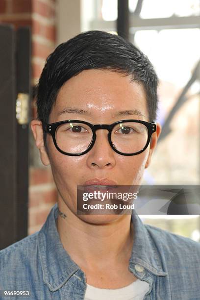 Model/actress Jenny Shimizu backstage at the DKNY Fall 2010 Fashion Show during Mercedes-Benz Fashion Week at 711 Greenwich Street on February 14,...