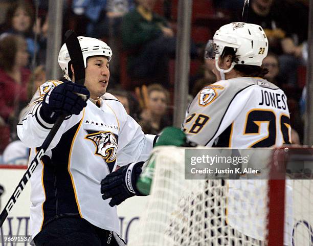 Jordin Tootoo of the Nashville Predators celebrates his goal with Ryan Jones against the Pittsburgh Penguins in the second period at Mellon Arena on...