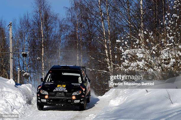 Mads Ostberg of Norway and Jonas Andersson of Sweden compete in their Adapta AS Subaru Impreza during leg 3 of the WRC Rally Sweden on February 14,...