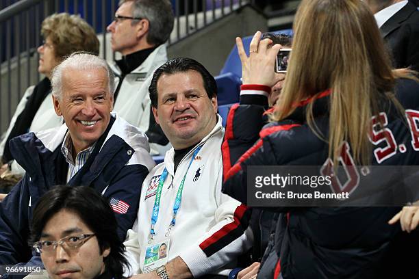 United States vice-president Joe Biden and Mike Eruzione pose for a photo at the women's ice hockey preliminary game between United States and China...