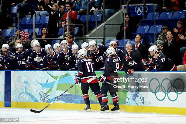 Angela Ruggiero of United States celebrates with her teammates after she scored against China during their women's ice hockey preliminary game at UBC...